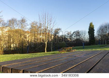 Empty Tables In The Park To Meet And Eat