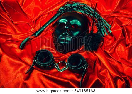 Bondage, Kinky Adult Sex Games, Kink And Bdsm Lifestyle Concept With A Mask, Pair Of Leather Handcuf