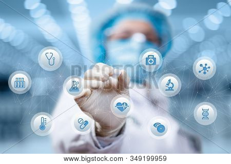 Concert Treatment With Medical Drugs. Doctor Shows Pill On Blurred Background.