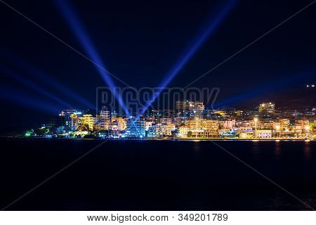 Night Photo Of Sarande In Albania In Background With Mediterranean Sea On Long Exposure