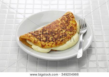 cachapa, venezuelan corn pancake with handmade cheese
