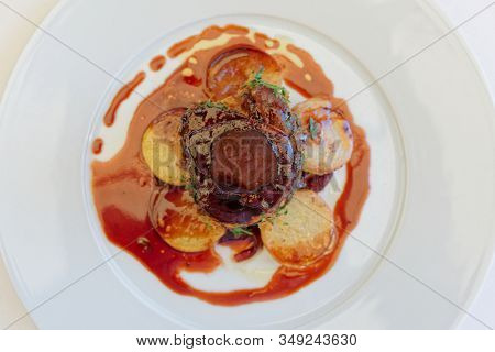 Fillet mignon steak with potatoes shot from above