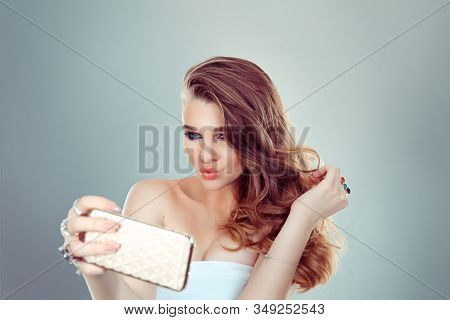 I Am Beautiful And I Know It. Portrait Of A Young Attractive Blonde Woman Making Selfie Photo On Sma