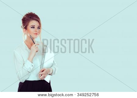 Thinking. Closeup Portrait Pensive Girl Thinking Holding Pad Computer Looking To Side Pen On Cheek W