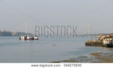 Panoramic Scenics Howrah Bridge Over Hooghly River. Photography In Winter Sunset From Babu Ghat Calc