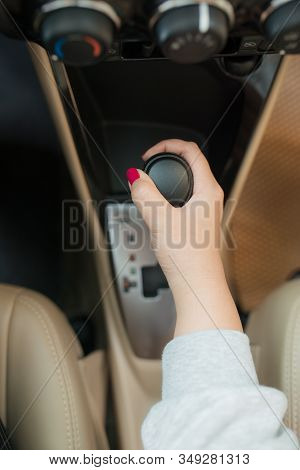 Woman Switches The Automatic Transmission's Close-up. Close-up Of The Driver's Adm Includes Mode Dri