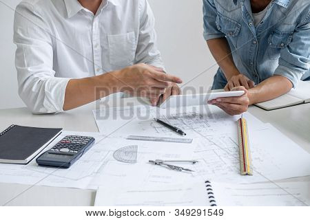Architecture Engineer Teamwork Meeting, Drawing And Working For Architectural Project And Engineerin
