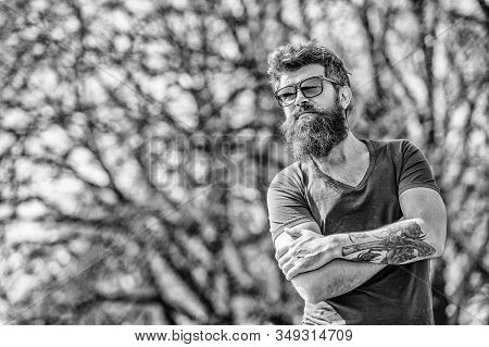 Bearded Man Wear Modern Fashionable Sunglasses. Uv Filter. Man Bearded With Sunglasses Nature Backgr