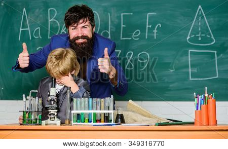 Teacher Bearded Man Father And Child Test Tubes. Study Chemistry Together. Boys Only. Personal Examp