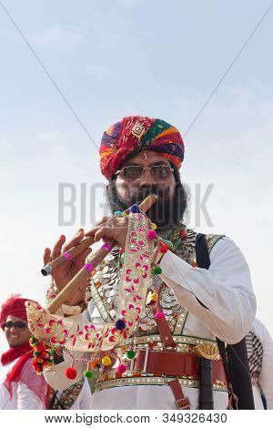 Bikaner, India - January 12, 2019: Indian Handsome Man With A Long Mustaches In National Clothes Pos