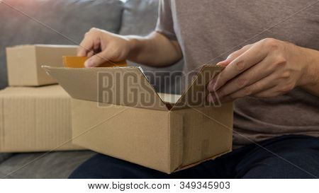 Startup Small Business Entrepreneur Sme, Young Asian Man Working With Laptop Computer And Delivery P