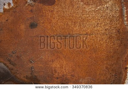 Wheathered Rust And Scratched Steel Texture Useful For Background. Shot In Front