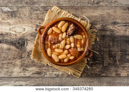 Typical Spanish Fabada Asturiana On Wooden Table. Top View