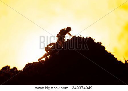 Battle Scene With Toy Warriors On Battleground And Fire On Yellow Background