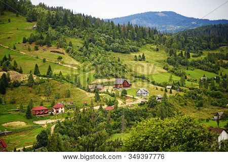Amaizing View Of Houses In Carpathian Mountains In West Part Of Ukraine. Famous Ukrainian Mountains 