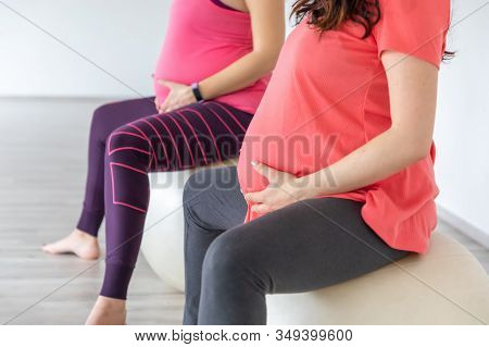 Pregnant Women Are Doing Yoga And Maditing In Yoga Class, Healthy Prenatal Lifestyle