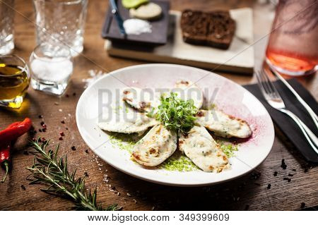Cooked Green Mussels With Parmegano And Cream Cheese