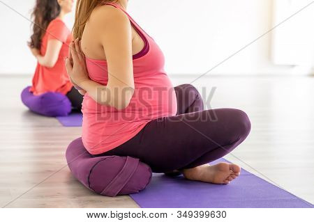 Pregnant Women Are Doing Yoga And Maditing In Yoga Class, Healthy Prenatal Lifestyle