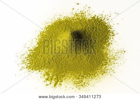 Top View Of Green Tea Matcha Powder Background. It Is A Rich Source Of Antioxidants And Polyphenols.