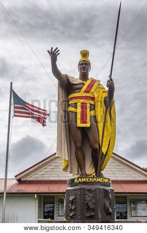 Kapaau, Hawaii, Usa. - January 15, 2020: Closeup Of Statue Of King Kamehameha, Decorated With Yellow