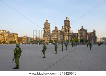Mexico City - Jan. 15, 2020: Raising Flag Guard Of Honor Stand On Zocalo In Front Of Metropolitan Ca