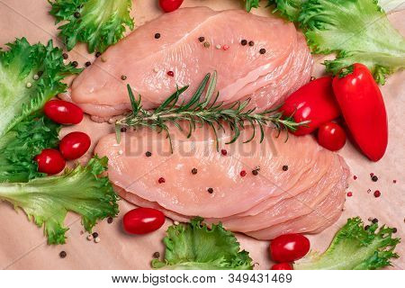 Raw sliced chicken meat close-up. Sotilissimo. Delicious dietary meat. Cooking,food of meat and fillets.Close-up view of raw, fresh, choped and sliced chicken meat.Sottilissime