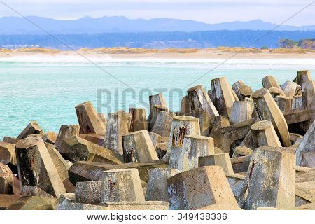 Dolos Concrete Block Reinforcements On A Collapsed Abandoned Pier Destroyed By Constant Harsh Pacifi