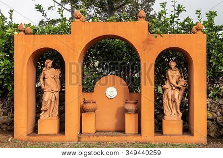 Waimea, Hawaii, Usa. - January 15, 2020: Parker Ranch Headquarters. Orange Statue In Garden Showing 