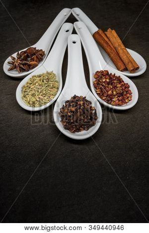 Five Spice With Cloves Focus On Black Slate Cutting Board
