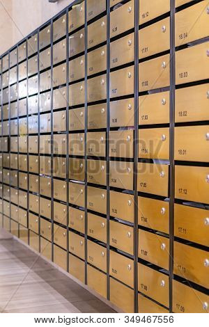 Rows Of Metallic Mailbox In Lobby Of Condominium Building