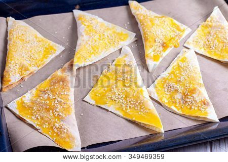 Samsa With Pumpkin On A Baking Tray.