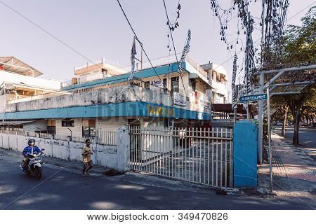 Manado, North Sulawesi, Indonesia - August 5, 2015: Morning View To Street Of Manado City With Runni