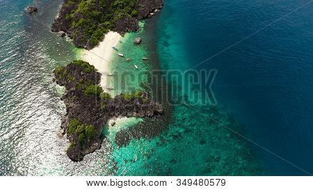 Beautiful Tropical Beach With Tourists And Boats, Aerial Drone. Lahos Island, Caramoan Islands, Phil