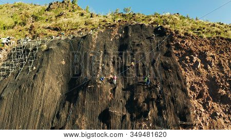 Protection Of Road From Mountain Slough, Rockfall With Metal Accumulative Restraining Net Fences. Wo