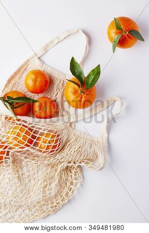Zero Waste, Plastic-free And Eco-friendly Lifestyle And Shopping. Cotton Mesh Bag With Organic Fruit
