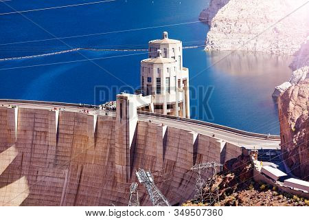 Tower On The Concrete Arch-gravity Hoover Dam In The Black Canyon Of The Colorado River On Nevada Ar