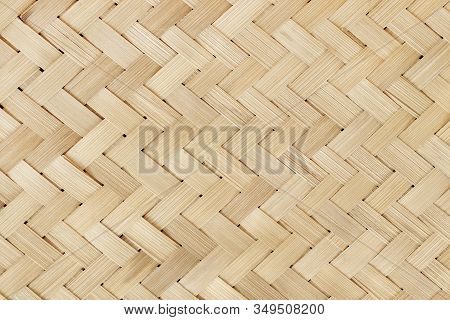 Old Bamboo Weaving Pattern, Woven Rattan Mat Texture For Background And Design Art Work.