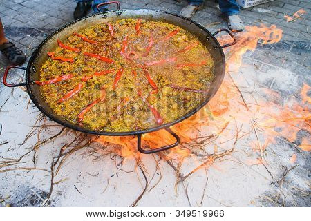 Cooking Of A Raditional Spanish Dish Paella