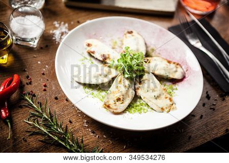 Cooked Green Mussels With Parmegano And Cream Cheese