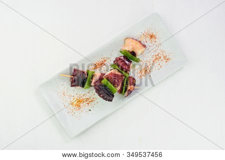 Japanese Sashimi Of Pulp On White Background
