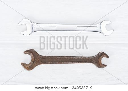 Top View Of Shiny And Rustle On White Wooden Surface
