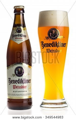 Groningen, Netherlands - February 06, 2020: Bottle And Glass Of Benediktiner Wheat Beer Isolated On 
