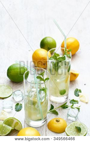 Homemade Refreshing Drink With Lemon And Lime Juice And Mint Close Up