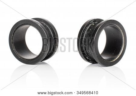Group Of Two Whole Black Plug Isolated On White Background