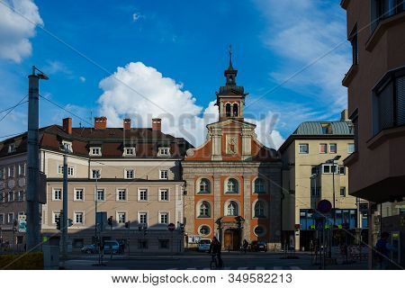 Insbruk, Austria - February 2020:pedestrians, Residents And Tourists In The Narrow Streets Of The Ol