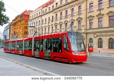 Bratislava, Slovakia - September 01, 2019: Red Tram On Snp Square With View Of Post Office Building