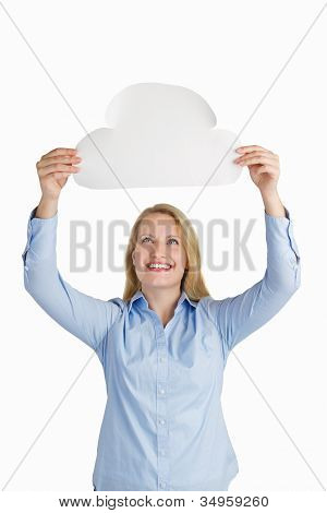 Female Holding A Paper Cloud And Smiling