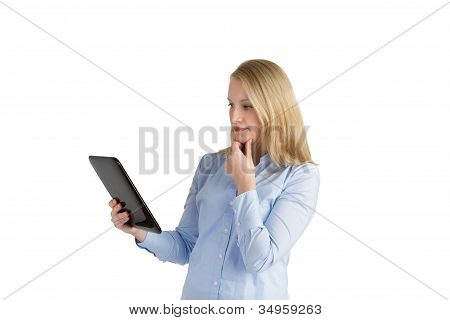 Attractive Woman Reading A Tablet