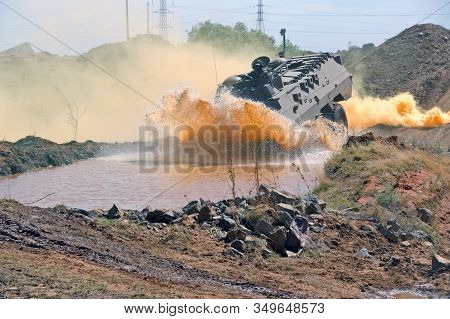 Bloemfontein, South Africa - November 1, 2008: A Ratel Command Infantry Fighting Vehicle Drivng Thro