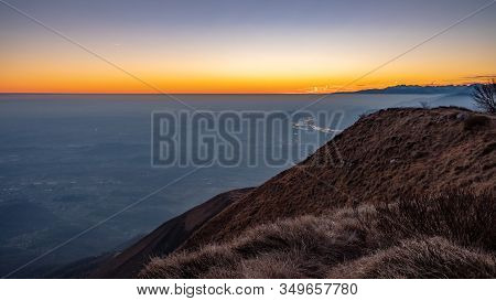 Winter Sunset From An Alpine Peak Of Friuli-venezia Giulia